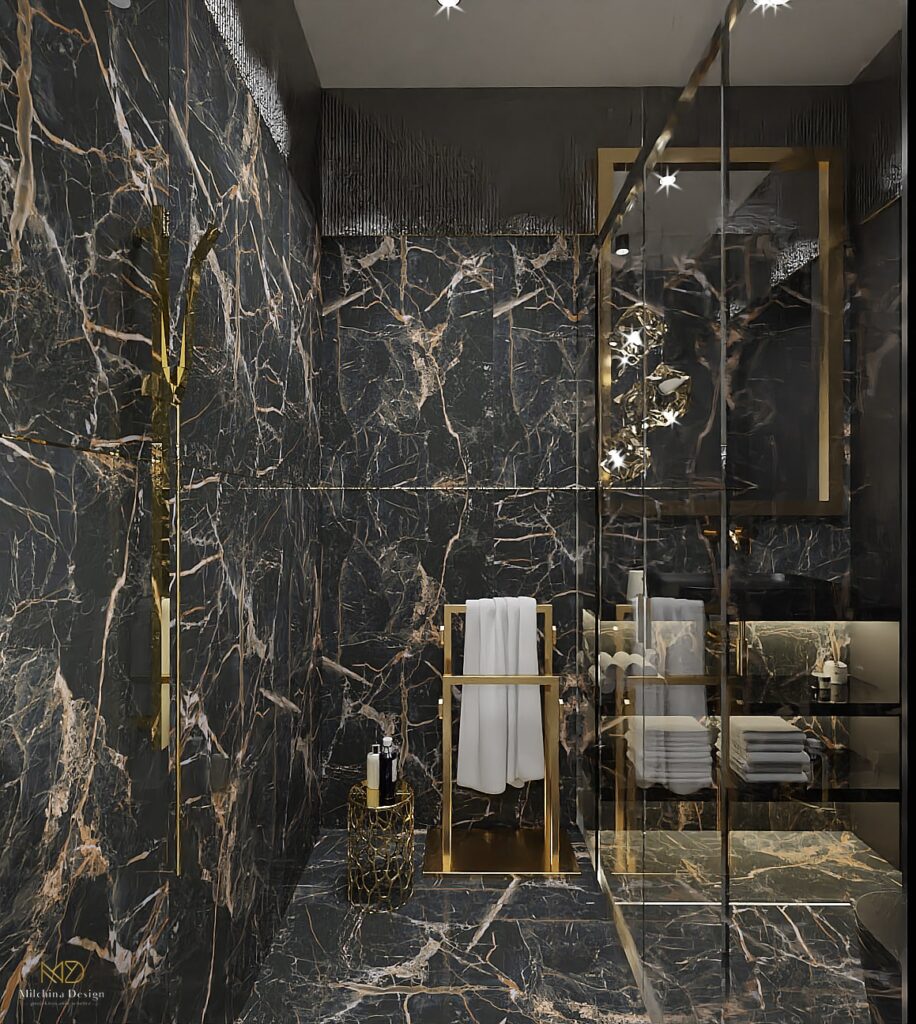 Elegancka czarna łazienka z dodatkami złota gres marmur
