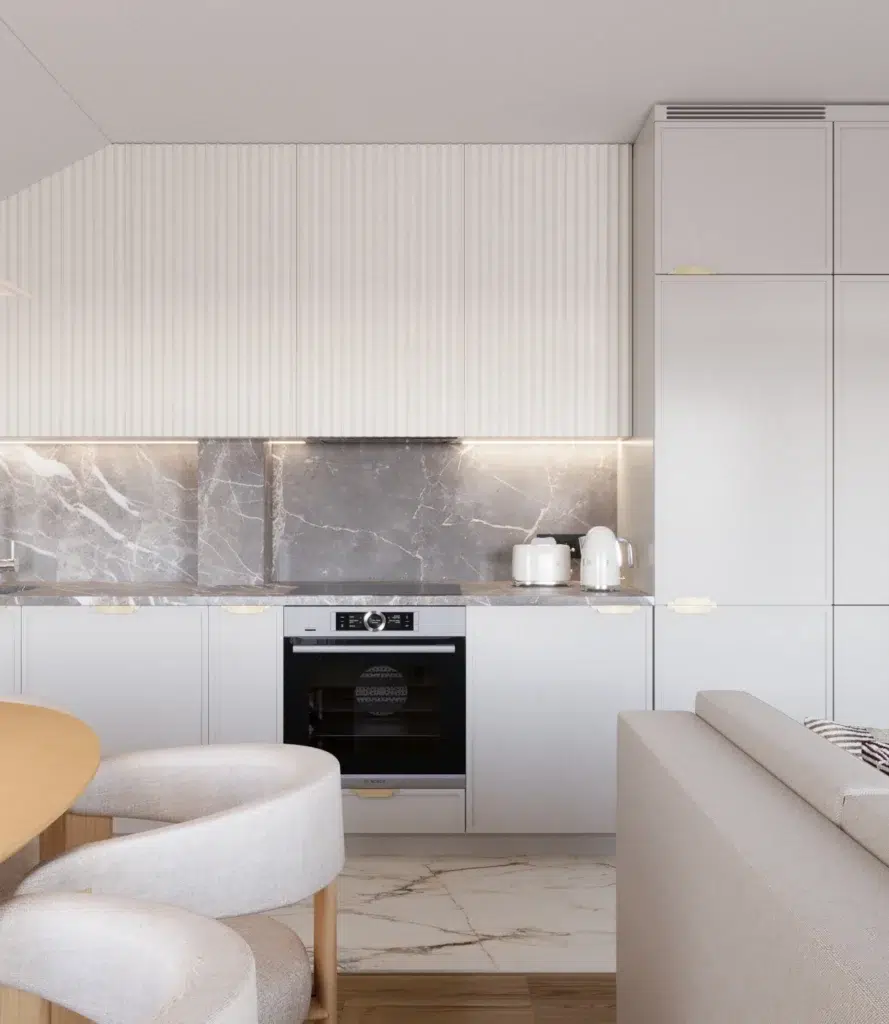 Nowoczesna kuchnia w jasnych kolorach z marmurowym blatem i ryflowanymi frontami, minimalistyczny projekt wnętrz